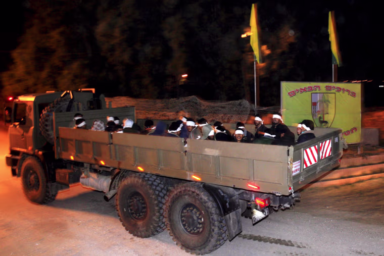Image: Israeli army turck with Palestinian prisoners taken from Gaza Strip