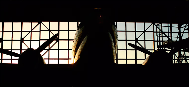 A C-46 sits in Buffalo Airways' enormous hangar. Walking through the building is like walking through an air museum, except all the planes still fly in regular service.
