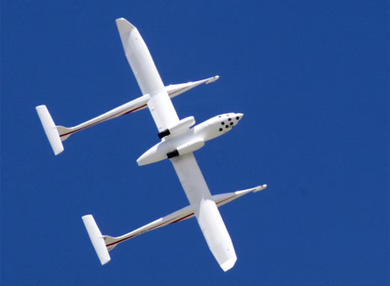 A privately-funded spacecraft is shown as it flies upside down above Mojave, Calif., after it was unveiled Friday, April 18, 2003. Famed aircraft designer Burt Rutan on Friday unveiled the rocket-powered spacecraft he hopes will carry three people on a suborbital flight into space and win a $10 million prize pledged to the first privately financed effort to do so. (AP Photo/Jamie Rector)