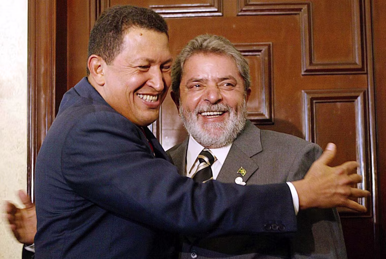 In this picture provided by the Brazilian government, Venezuela's President Hugo Chavez, left, hugs Brazilian President Luiz Inacio Lula da Silva, right, before their bilateral meeting during the Special Summit of the Americas in Monterrey, Mexico, Monday, Jan. 12, 2004. (AP Photo/Agencia Brasil, Ricardo Stuckert)