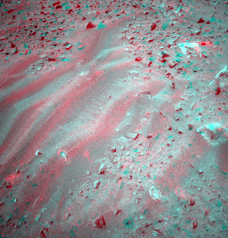 This is a three-dimensional stereo anaglyph of an image taken by the front navigation camera onboard the Mars Exploration Rover Spirit, showing an interesting patch of rippled soil. Spirit took this image on sol 37 (Feb. 9, 2004) after completing the longest drive ever made by a rover on another planet - 21.2 meters (69.6 feet). On sol 38 scientists plan to investigate this interesting location with the microscopic imager and Moessbauer spectrometer on Spirit's instrument deployment device.