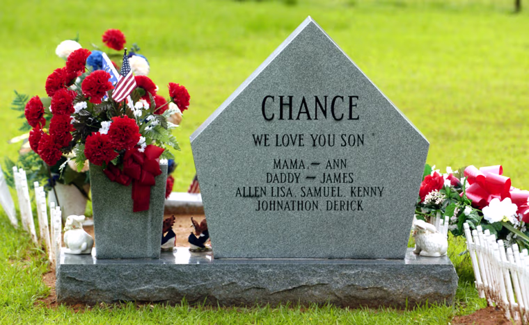 ** ADVANCE FOR SUNDAY, MAY 30 **The back of the tomb stone for James A. Chance III is engraved with the names of family members, shown May 18, 2004. (AP Photo/Rogelio Solis)