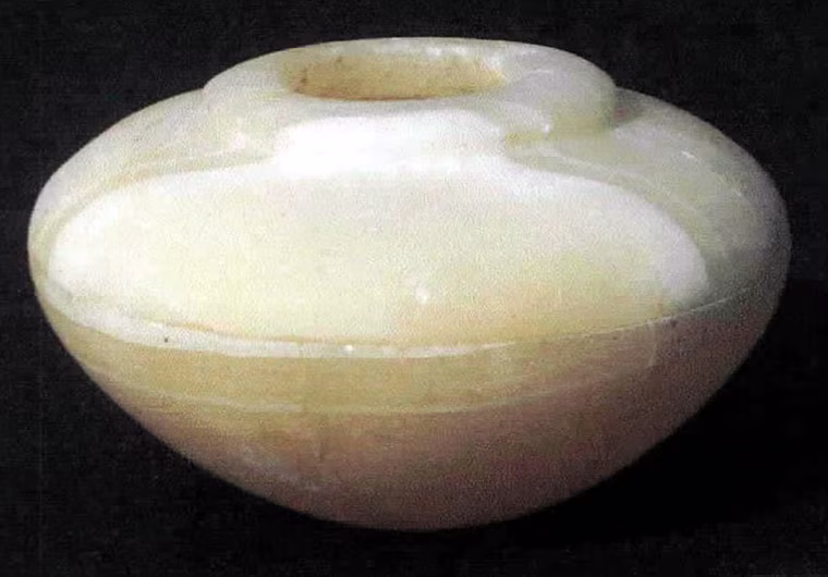 An alabaster pot discovered by Australian archaeologists who unearthed a 5,000-year-old necropolis with 20 well-preserved tombs dated to the first and fourth dynasties in Helwan town south of Cairo is seen in this photo released Sunday June 13, 2004. (AP Photo/HO)