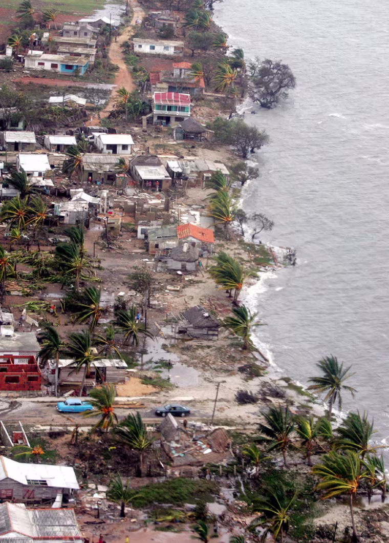 Aerial view of damaged houses in coastal town after Hurricane Ivan brushes Cuba