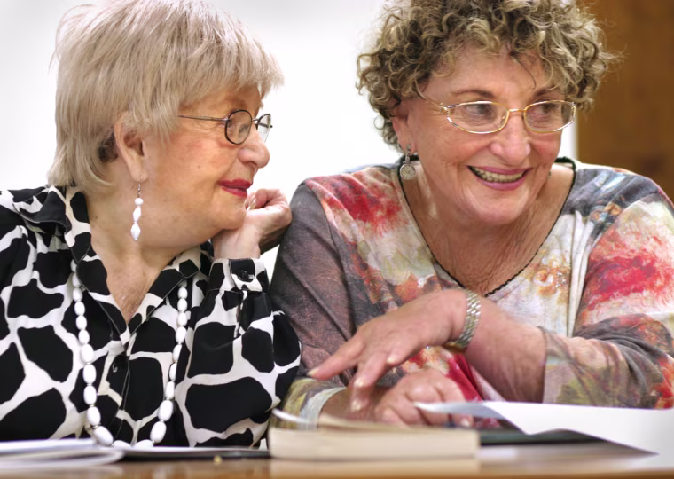 Sandy Baron, 86, (left) and Shirley robin, 75, work on a memory sharpening exercise in class at UCLA.