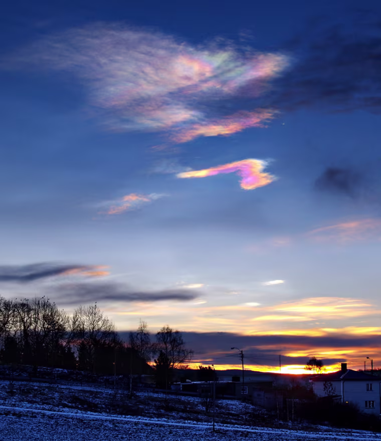 Mother of pearl clouds observed over Southern Norway at sunrise on 5th January 2005. They consist of ice particles and typically form when meteorological conditions cause local cold spots in the stratosphere. In this case they were formed in the so-called