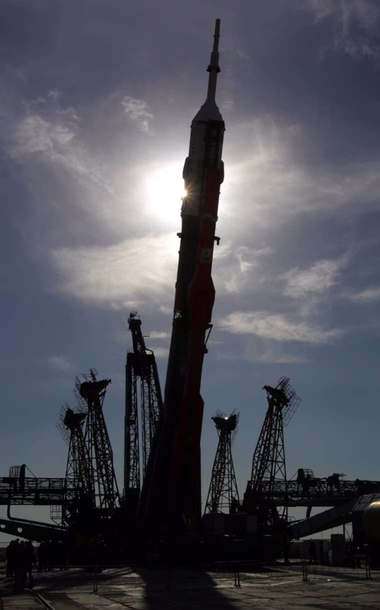 The Russian Soyuz rocket booster with Soyuz TMA-6 spaceship is erected at a launch pad at the Baikonur cosmodrome in Kazakhstan Wednesday, April 13, 2005. The next International Space Station (ISS) crew, American NASA astronaut John Phillips, Russian cosmonaut Sergei Krikalev, and Italian ESA astronaut Roberto Vittori is scheduled to blast off early Friday, April 15. (AP Photo/Ivan Sekretarev)