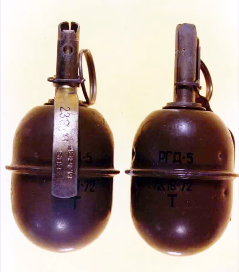 A photo of the grenade, courtesy of NBC News analyst William Arkin, of the type of grenade in the Bush incident in Tbilisi May 10th (NOTE: this is not THE grenade itself!) The Tbilisi pix is courtesy of NBC News. From NBC's Robert Windrem: Re the RGD-5 grenade, the type that was thrown in the President's direction during his Tbilisi, Georgia event on May 10, NBC News has obtained a color photo of the RGD-5, thanks to NBC News analyst William Arkin. The RGD-5 is a fragmentation grenade used throughout the Soviet bloc and elsewhere in the communist world of years gone by. RGD - 5 characteristics olive drab with black markings
