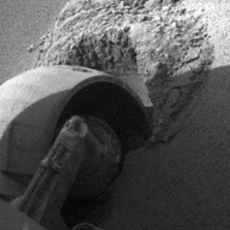 The left front wheel of NASA's Mars Exploration Rover Opportunity makes slow but steady progress through soft dune material in this movie clip of frames taken by the rover's front hazard identification camera over a period of several days. The sequence starts on Opportunity's 460th martian day, or sol (May 10, 2005) and ends 11 days later. In eight drives during that period, Opportunity advanced a total of 26 centimeters (10 inches) while spinning its wheels enough to have driven 46 meters (151 feet) if there were no slippage. The motion appears to speed up near the end of the clip, but that is an artifact of individual frames being taken less frequently.