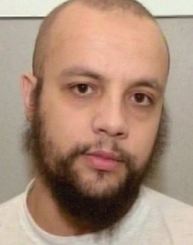 ** FILE ** Mohammed Bouyeri, confessed killer of Dutch filmmaker Theo van Gogh, is seen in this image from the Dutch television program 'Opsporing Verzocht', which was aired on Monday, Nov. 29, 2004. A Dutch court sentenced Bouyeri to life imprisonment on Tuesday, July 26, 2005, handing down the harshest sentence possible for a murder that stunned the country. Bouyeri, 27, had mounted no defense at his two-day trial earlier this month for the slaying of Theo Van Gogh on Nov. 2, 2004, whom he accused of insulting Islam, and told the court he would do it again if given the chance. (AP Photo/Justice Ministry via Dutch television) ** NETHERLANDS OUT **