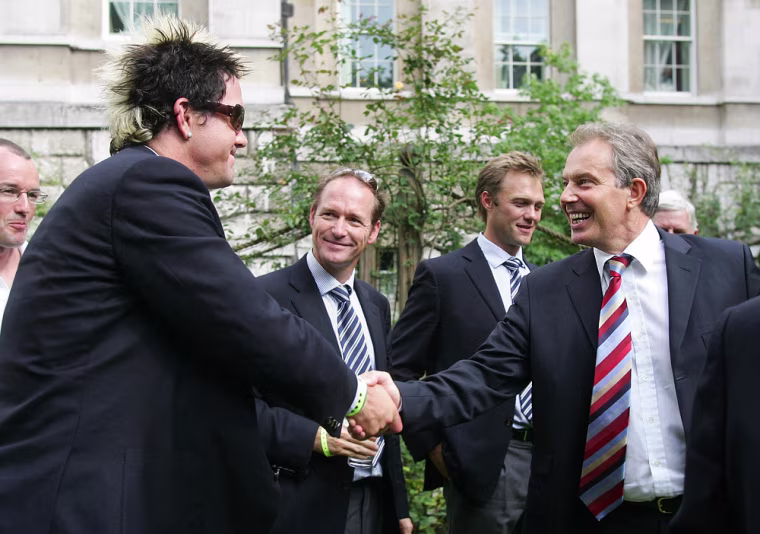 Britain's Prime Minister Tony Blair shakes the hand of England cricketer Kevin Pietersen, left, during a reception at 10 Downing Street in central London, Tuesday Sept. 13, 2005 in honour of the England cricket team who beat Australia in a five-match series to regain the Ashes. (AP Photo/Mike Finn-Kelcey, POOL)