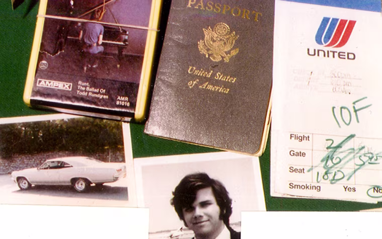 A redacted police photograph of the belongings Mark David Chapman left behind in a New York hotel room.