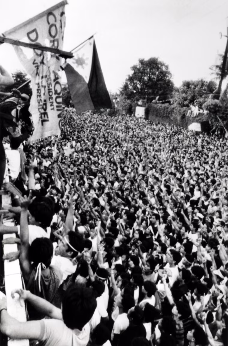 PEOPLE FORMING A PROTECTIVE SHIELD