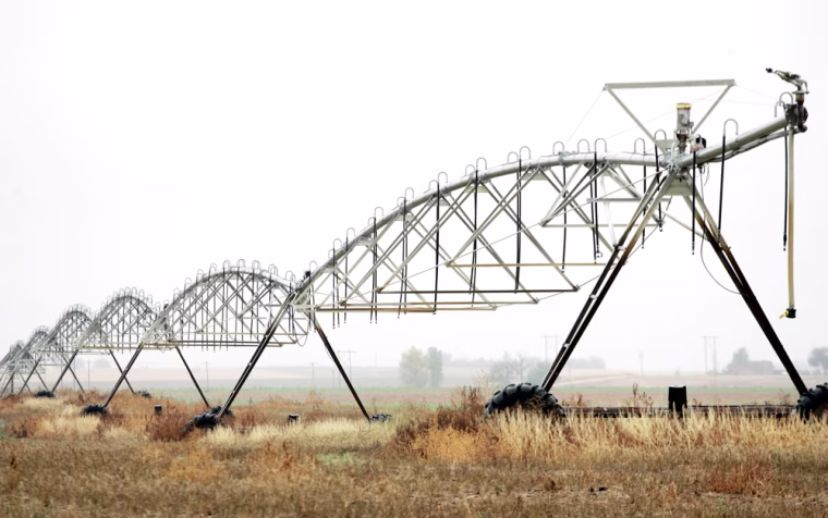 An irrigation system is shown idle in farmer Gary Weibert's field near Wiggins, Colo., Oct. 9, 2006. An eastern Colorado water crisis came to a head last May when the state engineer told farmers along the South Platte, including Weibert, to turn off 440 irrigation wells after forecasting lower-than-average flows in the river and well owners failed to come up with plans to replace the water they were using.  (AP Photo/Jack Dempsey)