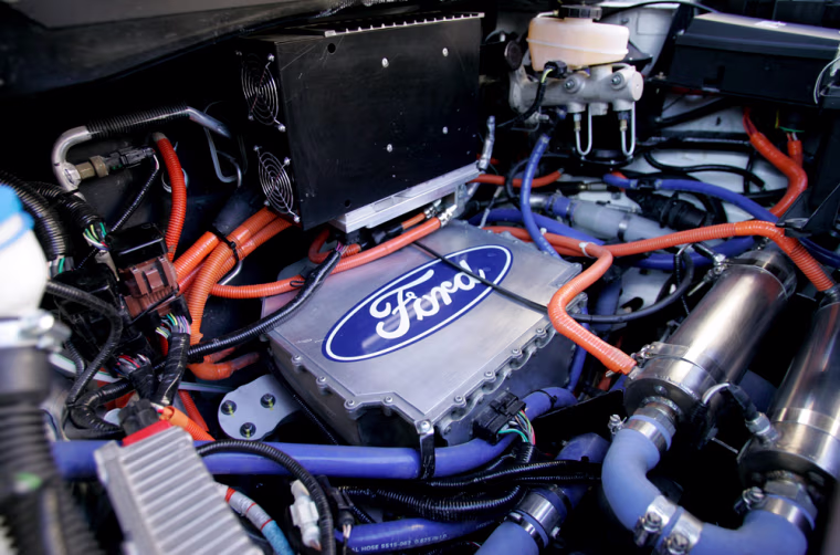 ** EMBARGOED UNTIL 12:01 A.M. TUESDAY, JAN. 23 **The engine compartment of a Ford plug-in hybrid Edge in Washington, Friday, Jan. 17, 2007. Ford Motor Co., showcasing its advanced technology to key policymakers, is unveiling a new battery-powered plug-in hybrid vehicle coupled with a hydrogen fuel cell that generates zero emissions and plenty of potential. (AP Photo/Manuel Balce Ceneta)