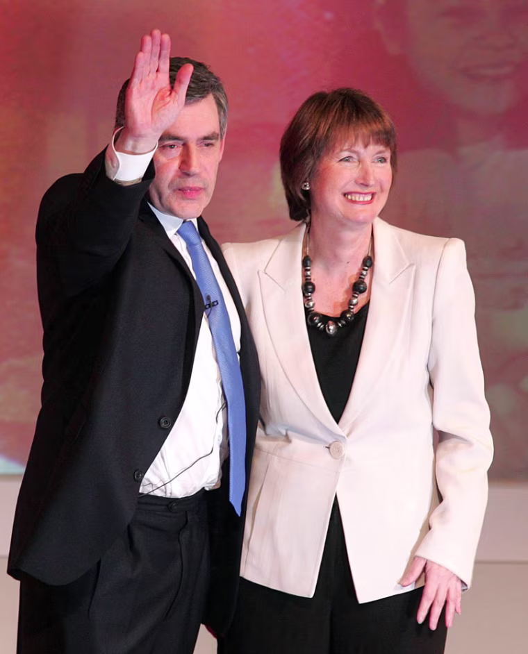 Gordon Brown, left, Britain's Treasury chief, who will become prime minister on Wednesday and Justice minister Harriet Harman acknowledge applause at a Labour leadership conference in Manchester England Sunday June 24, 2007. Brown vowed on Sunday to change Britain to meet new priorities, taking over from Tony Blair as leader of the Labour party days before he succeeds Blair as prime minister. Harman, who has called for the government to apologize for mistakes over the Iraq war, won a vote among 3.5 million party and labor union members and was named Brown's deputy. (AP Photo/Martin Rickett/PA Wire) ** UNITED KINGDOM OUT NO SALES NO ARCHIVE **