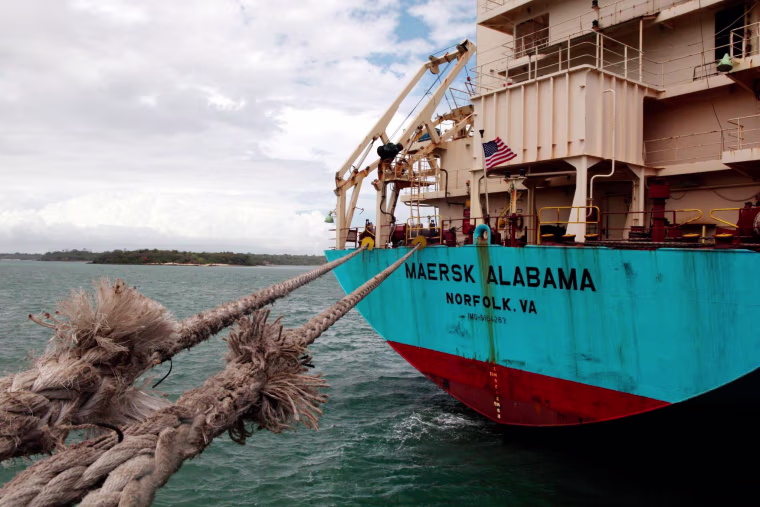 Image: The American flag flies from the aft deck of the of 17,000-ton, Danish-owned Maersk Alabama