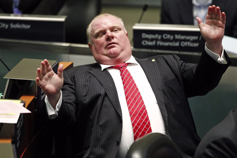 Image: Toronto Mayor Rob Ford reacts during a special council meeting at City Hall in Toronto