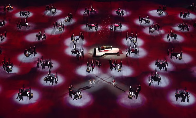 Image: Russian pianist Matsuev performs during the closing ceremony for the 2014 Sochi Winter Olympics