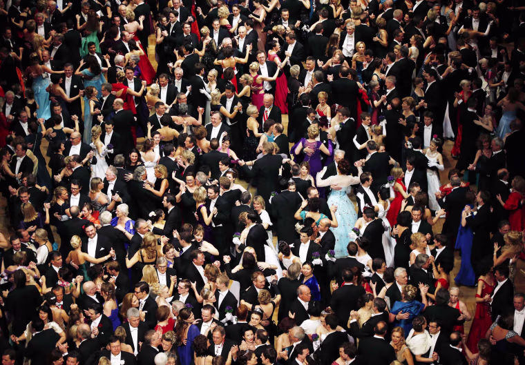 Image: Visitors dance at the Opera Ball in Vienna