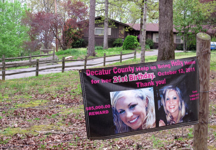Image: A poster with the face of missing Tennessee nursing student Holly Bobo