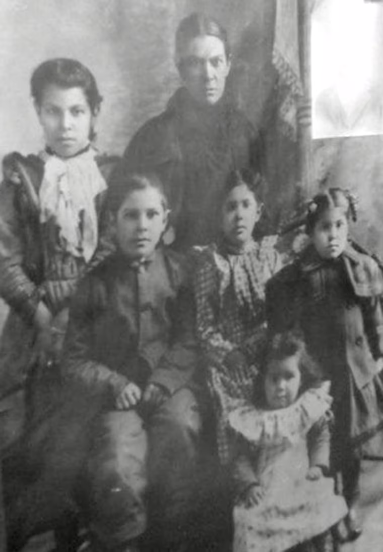 Northern New Mexico College prof. Patricia Perea's ancestor, Martita Baca, is shown in a picture with her children around 1900 in New Mexico - before it was incorporated as a state.