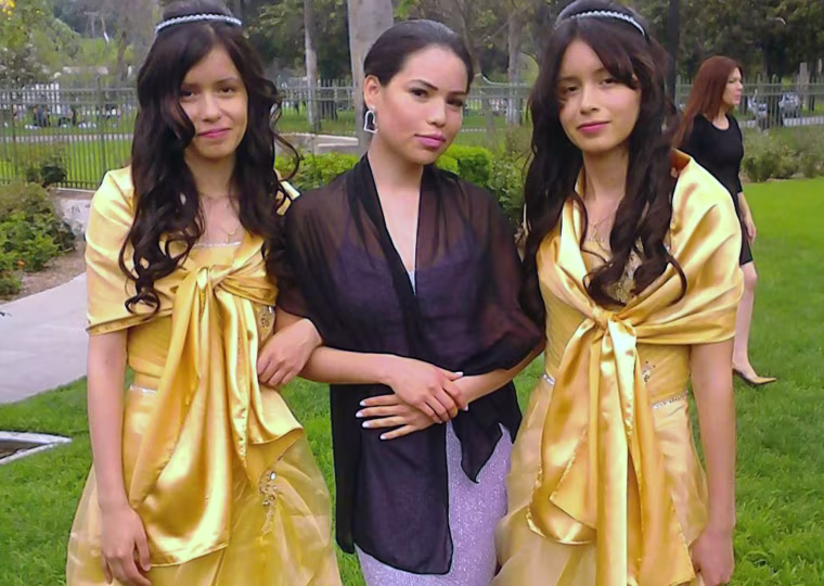 This 2013 photo provided by Miguel Serrato shows twin sisters Marisol Serrato, 17, left, and Marisa Serrato, right, with their sister-in-law Ivette Serrato during a wedding in Riverside, Caif.