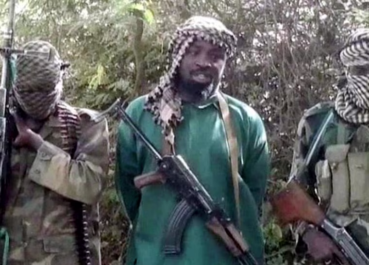 Image: Abubakar Shekau, center, the suspected leader of Nigerian Islamist extremist group Boko Haram
