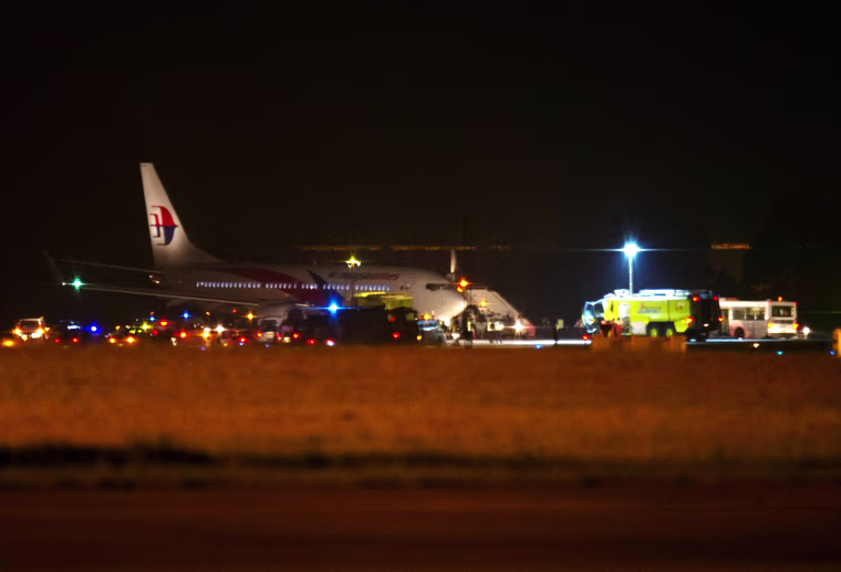 Image: Malaysia Airline flight MH192 is seen on the tarmac after an emergency landing at the Sepang International Airport, outside Kuala Lumpur