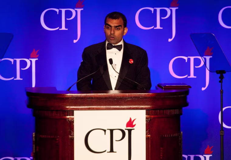 Image: Pakistani journalist Umar Cheema accepts the 2011 International Press Freedom award