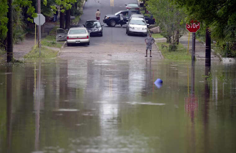 Image: Floodwaters cover Strong Street in Pensacola, Fla.