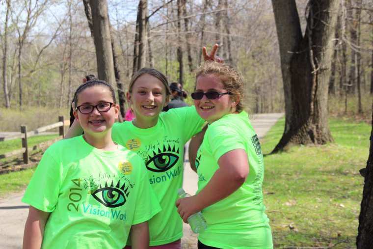 Lilly, right, at the 2014 VisionWalk at Kensington Metropark in Milford, Michigan.