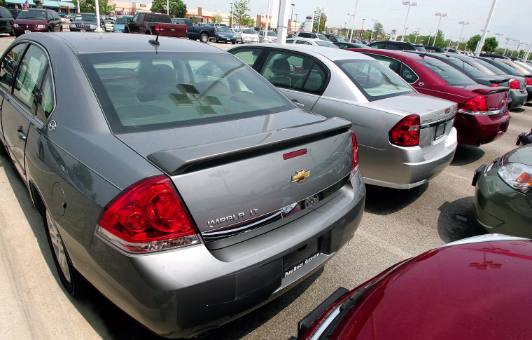 Image: Chevrolet Impalas are parked at a dealership in 2006.