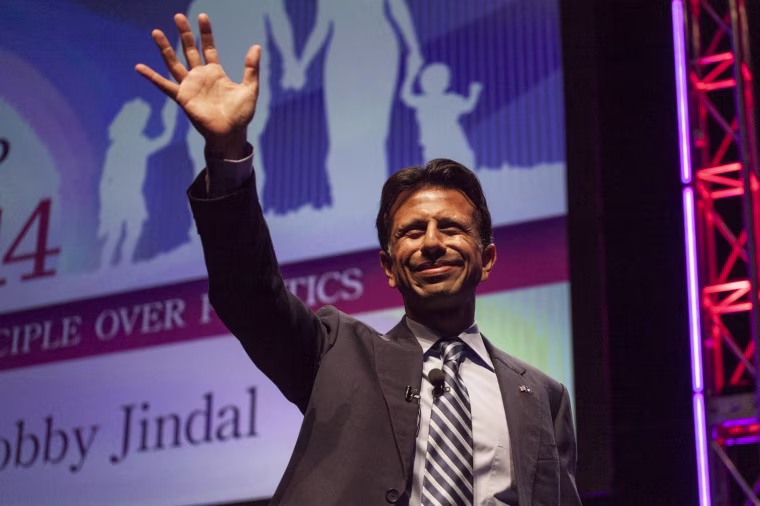 Image: Louisiana Governor Jindal waves as he speaks at the Family Leadership Summit in Ames