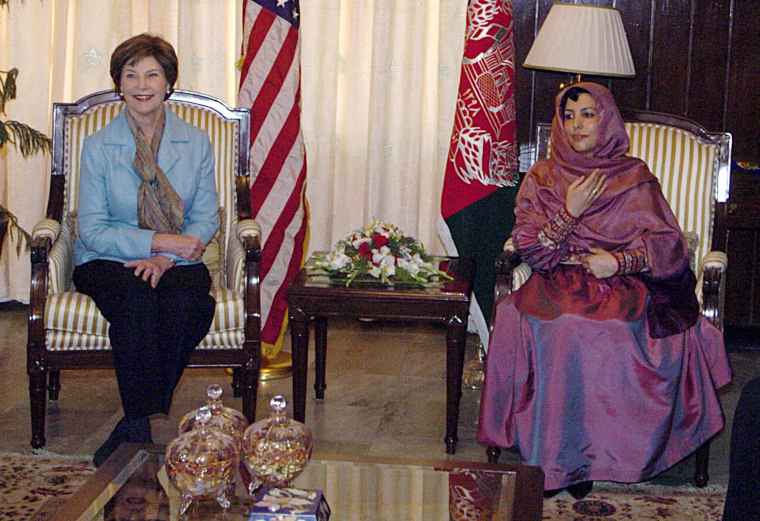 U.S. First Lady talks with Afghan First Lady during a meeting at the Presidential Palace in Kabul