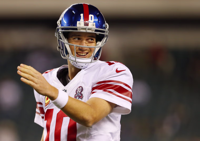 Image: Eli Manning #10 of the New York Giants warms up before the start of a game against the Philadelphia Eagles 