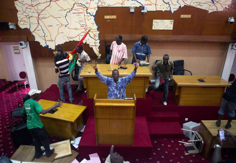 Image: Anti-government protesters take over the parliament building in Ouagadougou