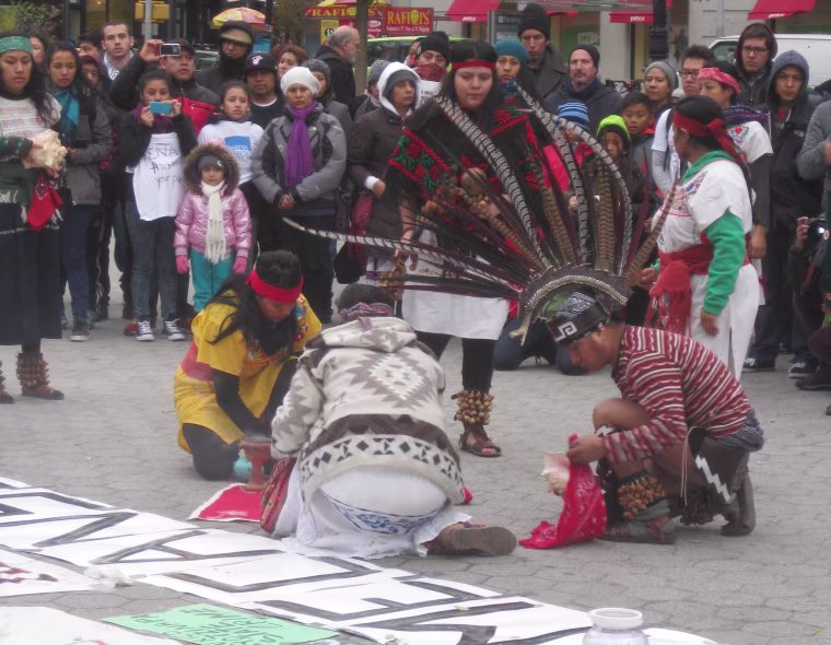 Fathers, mothers, children, activists and others gathered for a vigil in New York City on Sunday, Nov. 16 to demand justice for the 43 students from Guerrero, Mexico who disappeared over 7 weeks ago.