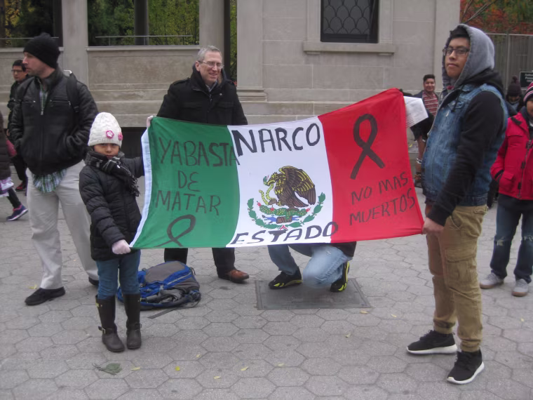 Fathers, mothers, children, activists and others gathered for a vigil in New York City on Sunday, Nov. 16 to demand justice for the 43 students from Guerrero, Mexico who disappeared over 7 weeks ago.