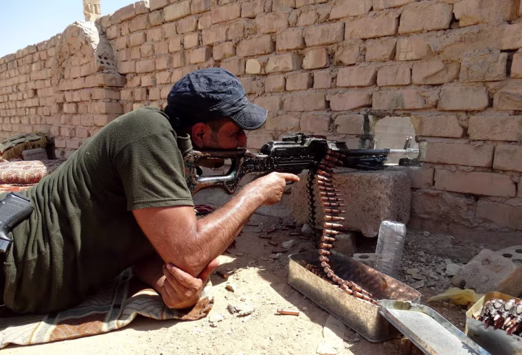 Image: Security forces supported by local tribes prepare to fight against ISIS