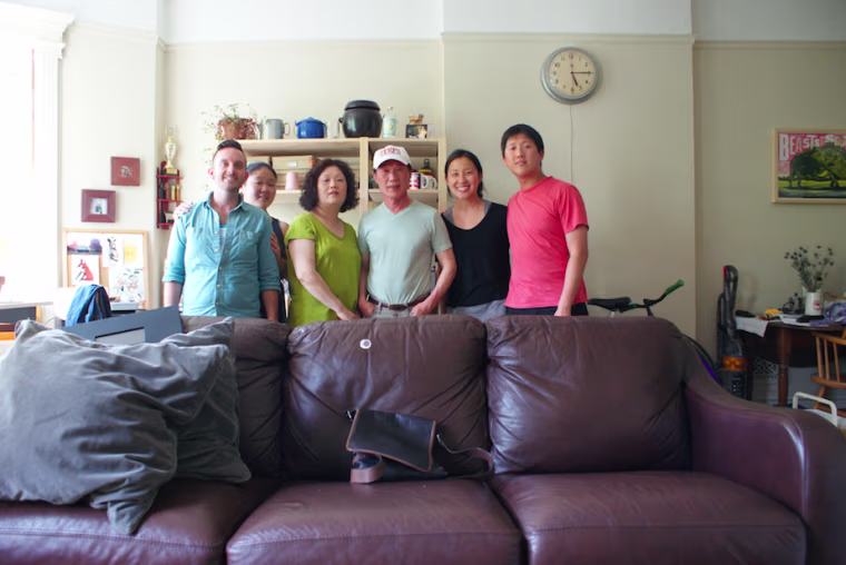 Family photo of Mike, Yuri, Yuri's parents, Yuri's sister-in-law Sandy, and Yuri's brother Alan.