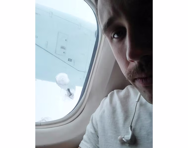 A bolt came off a propeller on a Nov. 25 flight over Vancouver and lodged into this window.