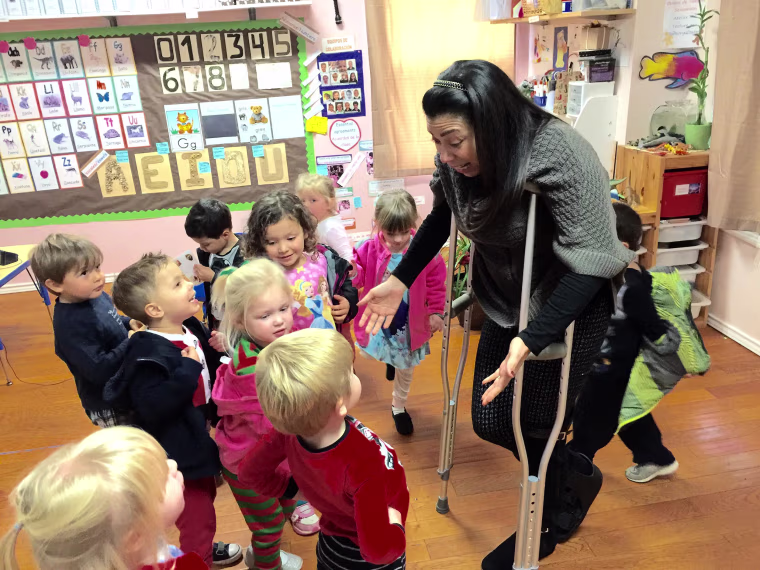 Adriana Rodriguez greets students at her language school in Austin, Texas. Rodriguez took a big gamble and wore many hats - teacher, manager and cleaning lady - when she opened the school.