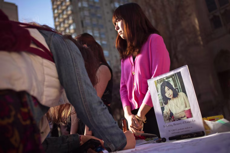 Image: A photo of Boston Marathon bombing victim Lu is seen outside the Boston University Marsh Chapel in Massachusetts