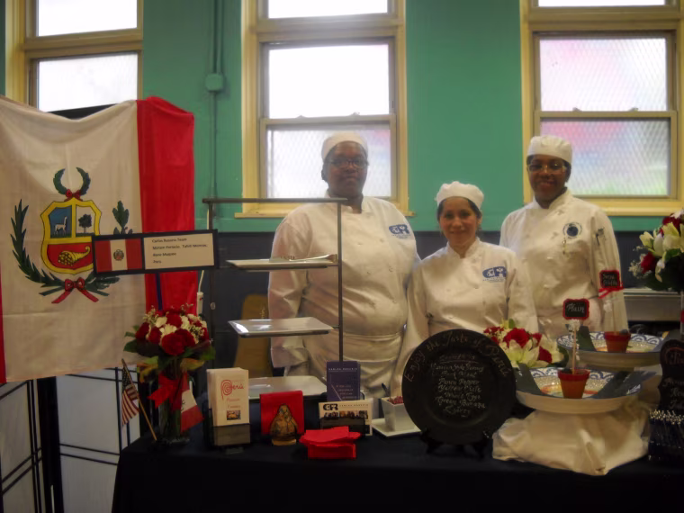 Miriam Perlacio, middle, a native of Lima, Peru, prepared Peruvian tamales for TamalFest DC. Tamales from Peru use ground up white corn for the masa.