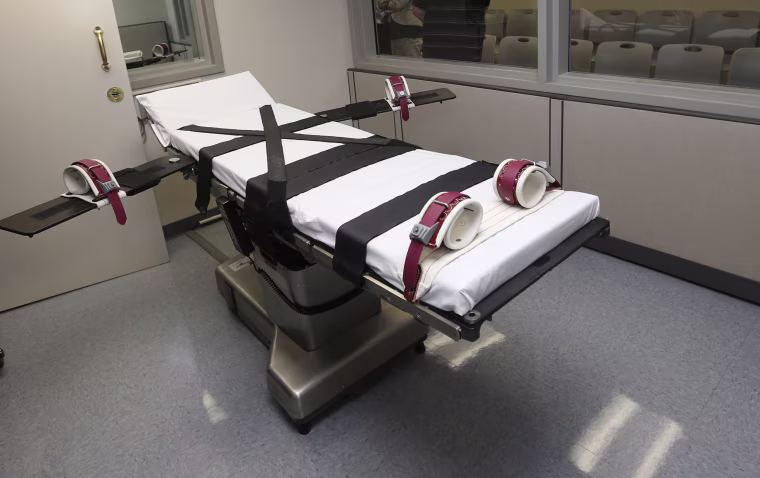 This Oct. 9, 2014 file photo shows the gurney in the the execution chamber at the Oklahoma State Penitentiary in McAlester, Okla.