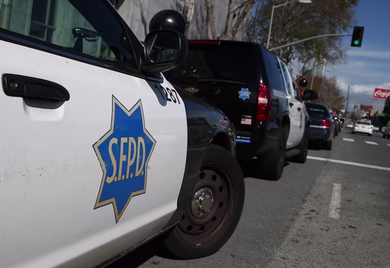 Image: San Francisco police cars sit parked in front of the Hall of Justice 