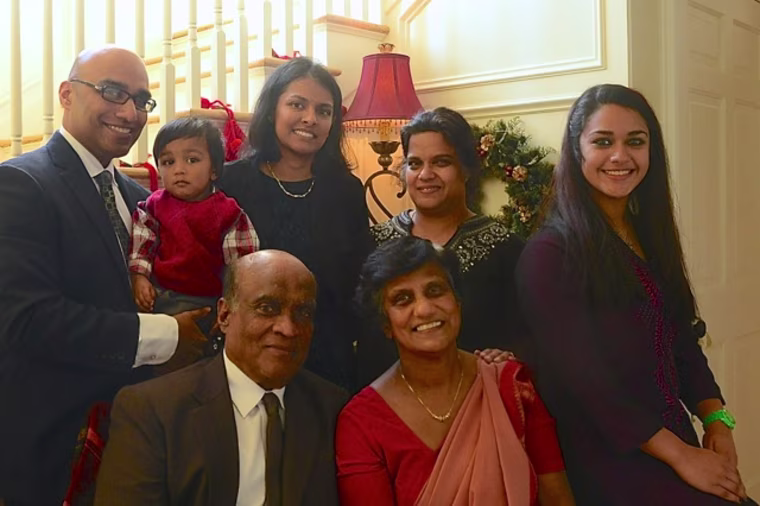 Thomas Mathew and his family for a group picture.