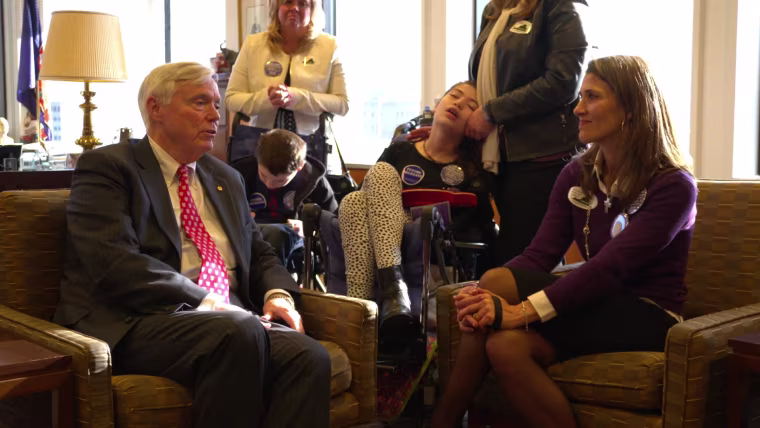 Lisa Smith and her daughter Haley with Virginia House Speaker James Howell, Republican.