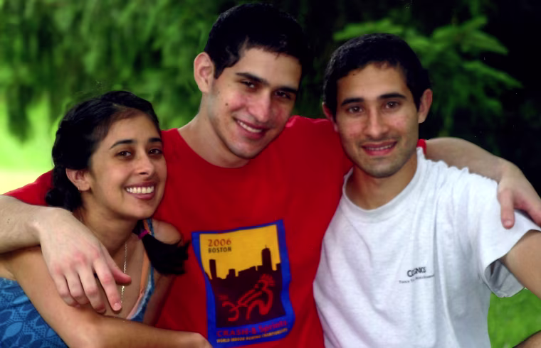 A picture of Sangeeta Tripathi, Sunil Tripathi, and Ravi Tripathi (left to right).